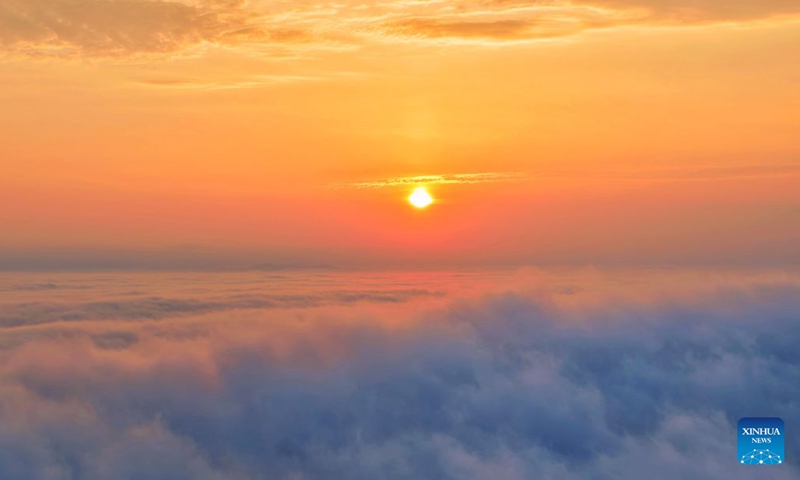 A drone photo taken on July 7, 2026 shows the sun over the sky in Tongjiang City, northeast China's Heilongjiang Province. Lesser Heat, or Xiaoshu, one of China's 24 solar terms, fell on Tuesday this year, coinciding with the appearance of the year's smallest sun in the sky. (Photo: Xinhua)