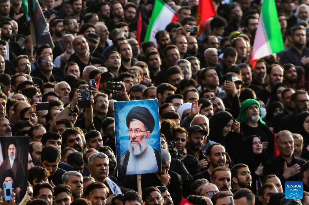 People attend a funeral ceremony for Iran's late Supreme Leader Ali Khamenei in Qom, Iran, July 7, 2026. (Photo: Xinhua)