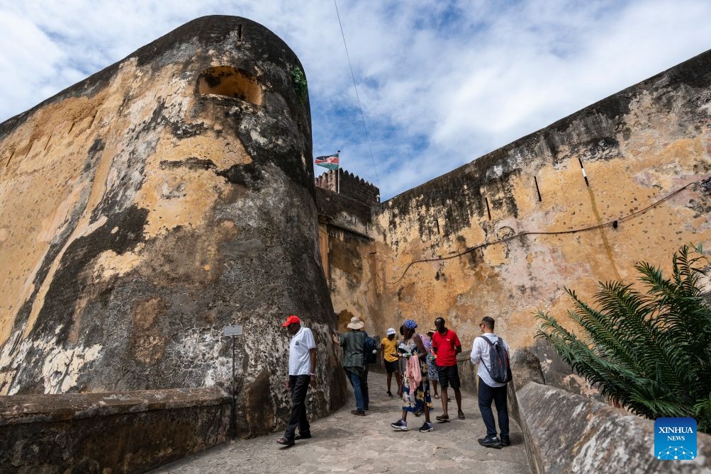 People visit Fort Jesus in the Old Town of Mombasa, Kenya, July 7, 2026. The Old Town of Mombasa, located on the southeastern side of Mombasa Island in Kenya, was once home to Swahili, Arab, Portuguese and other communities. As one of the best-preserved historic Swahili districts in East Africa, it remains an important center for preserving and showcasing Swahili culture. Rich in multicultural heritage and historical landmarks, the Old Town is also one of Kenya's major tourist destinations. (Photo: Xinhua)