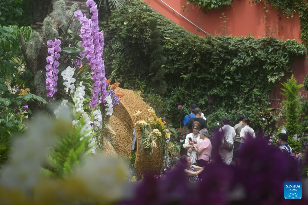 People view orchids from around the world during two orchid exhibitions at Gardens by the Bay in Singapore on July 7, 2026. (Photo: Xinhua)