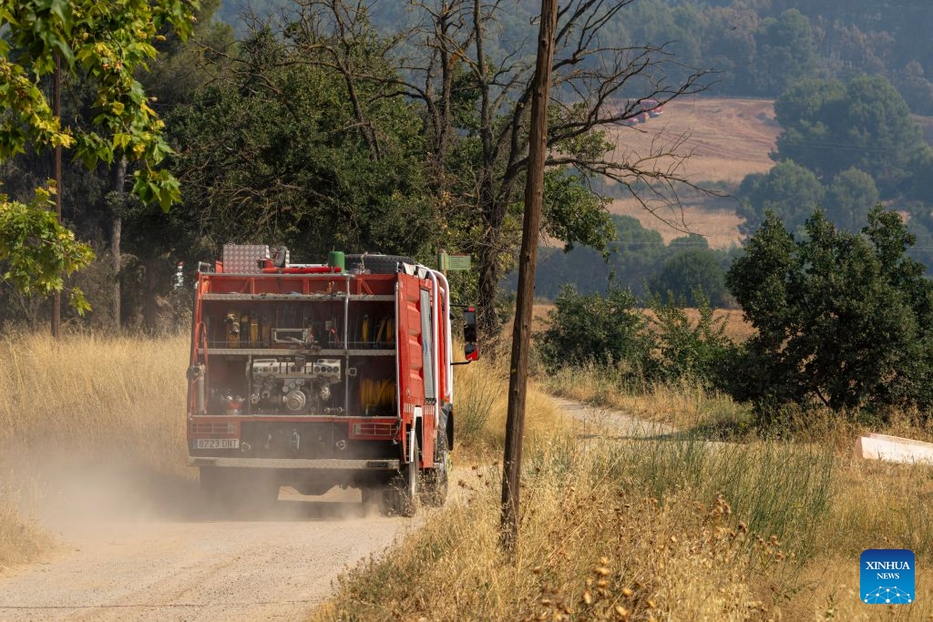 A fire engine heads toward a wildfire area in Sentmenat, Barcelona, Spain, on July 7, 2026. According to satellite-based estimates from the European Forest Fire Information System (EFFIS), wildfires have burned around 56,000 hectares in Spain so far this year. (Photo: Xinhua)