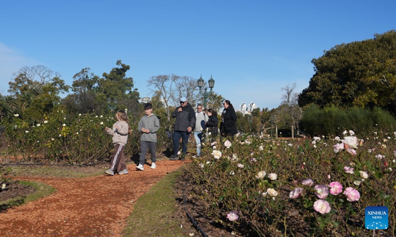 People take a walk at the Rose Garden in Palermo, Buenos Aires, the capital of Argentina, on July 7, 2026. The Rose Garden in Palermo, Buenos Aires, the capital of Argentina, has recently begun its 2026 rose-pruning season. The annual winter tradition held every July allows residents to take home pruned rose cuttings to grow in their own gardens. The Rose Garden in Palermo, established in 1914 and covering 3.4 hectares, is one of Buenos Aires' best-known parks. (Photo: Xinhua)