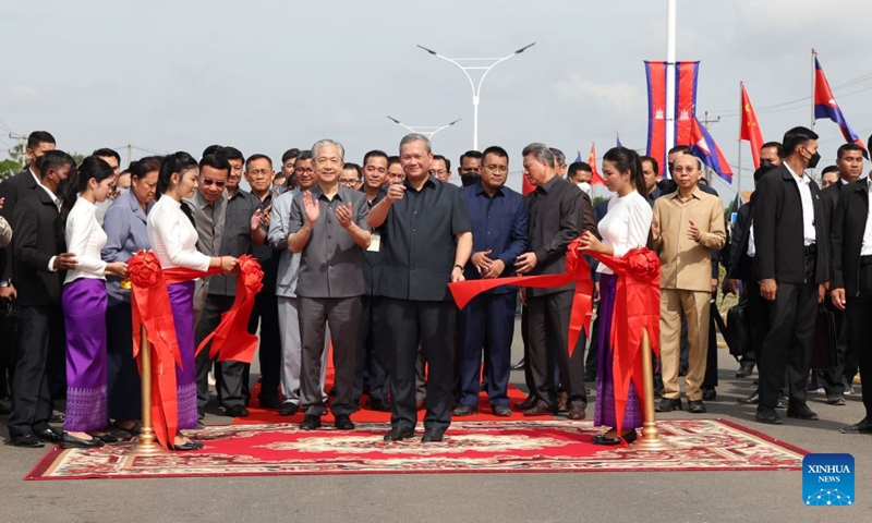 Cambodian Prime Minister Hun Manet (C, front) cuts the ribbon at the inauguration of a section of National Road 7 in Kampong Cham province, Cambodia, on July 7, 2026. Cambodia on Tuesday inaugurated a section of the expanded China-funded National Road 7 here in the kingdom's central region, which was expected to boost regional trade and tourism. (Photo: Xinhua)