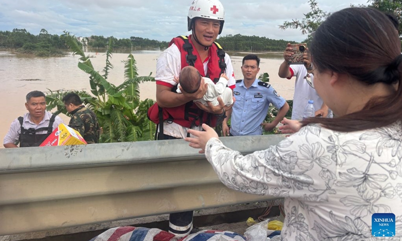 Rescuers transfer stranded residents in Binyang County of Nanning, south China's Guangxi Zhuang Autonomous Region, July 7, 2026. Recent extreme rainstorms triggered by Typhoon Maysak, the 10th typhoon of the year, have caused severe flooding in parts of south China's Guangxi Zhuang Autonomous Region. (Photo: Xinhua)