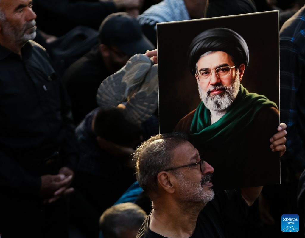 People attend a funeral ceremony for Iran's late Supreme Leader Ali Khamenei in Qom, Iran, July 7, 2026. (Photo: Xinhua)