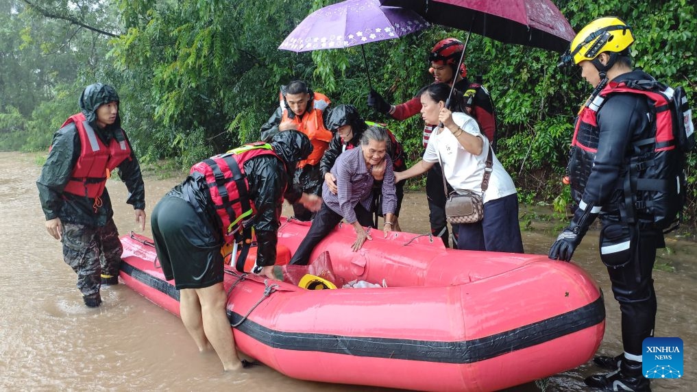 Rescuers transfer stranded villagers in Jiulong Town of Qinzhou City, south China's Guangxi Zhuang Autonomous Region, July 6, 2026. Recent extreme rainstorms triggered by Typhoon Maysak, the 10th typhoon of the year, have caused severe flooding in parts of south China's Guangxi Zhuang Autonomous Region in the Pearl River basin. (Photo: Xinhua)