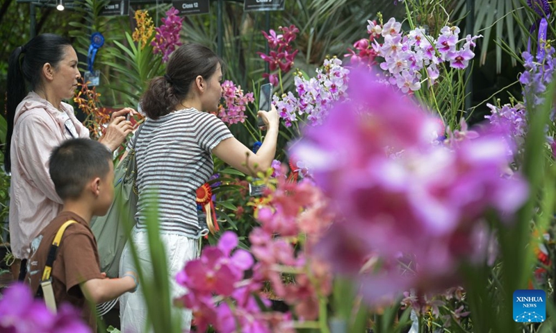 People view orchids from around the world during two orchid exhibitions at Gardens by the Bay in Singapore on July 7, 2026. (Photo: Xinhua)