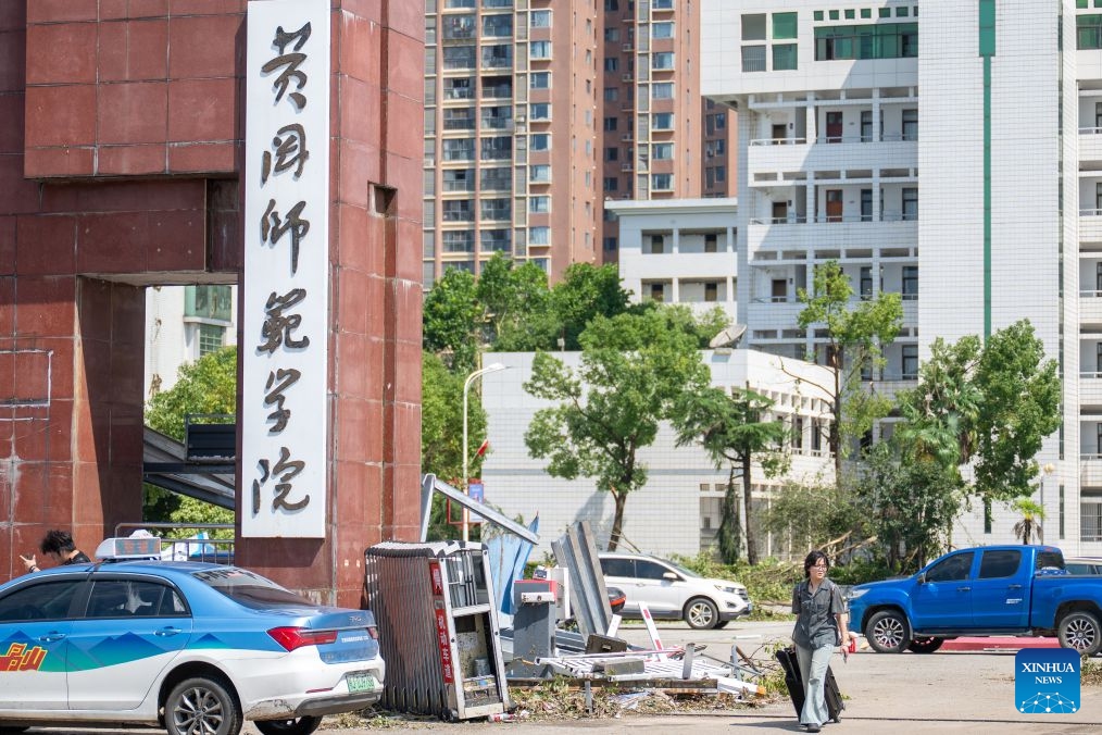 A student is evacuated from Huanggang Normal University of Huanggang City in central China's Hubei Province, July 8, 2026. A tornado struck the urban area of Huanggang City on Monday, causing damage to multiple buildings of Huanggang Normal University. Following the disaster, the university immediately carried out emergency response overnight. On Tuesday, the university started to evacuate students in batches from the campus. Currently, all resettlement and restoration efforts are progressing in an orderly manner. (Photo: Xinhua)