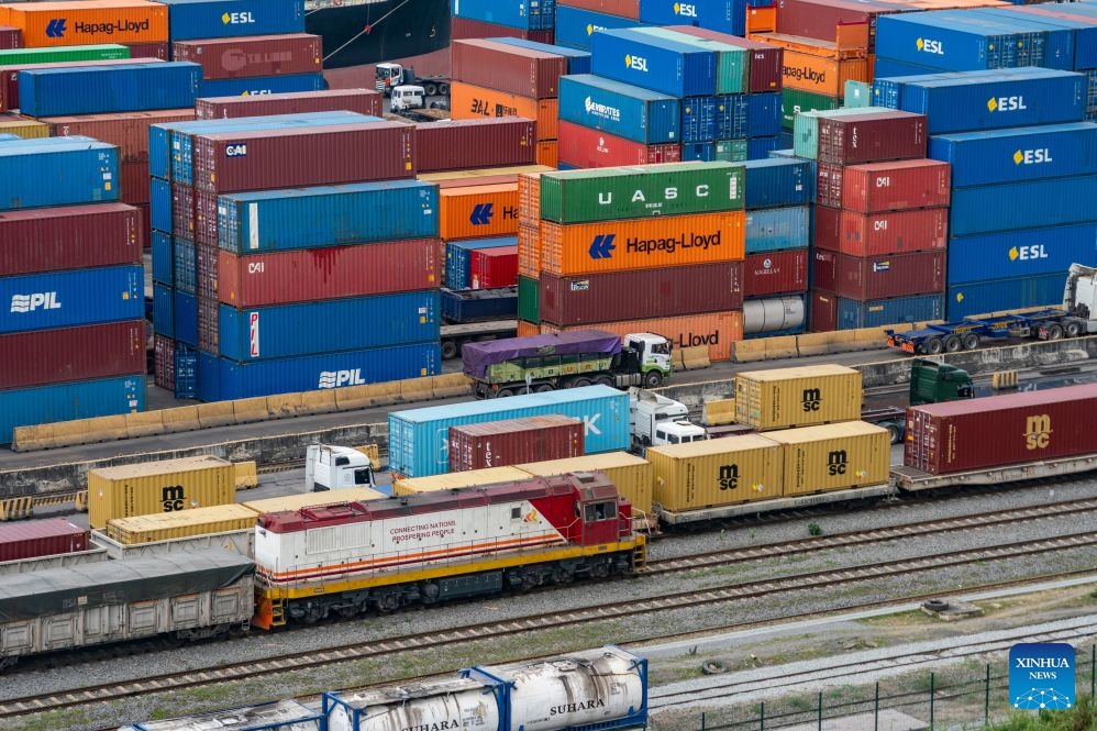 This photo taken on July 8, 2026 shows a cargo train on the Mombasa-Nairobi Standard Gauge Railway (SGR) enters the Port of Mombasa in Mombasa, Kenya. The Port of Mombasa, located on Kenya's southeastern coast along the Indian Ocean, is the largest port in East Africa. (Photo: Xinhua)