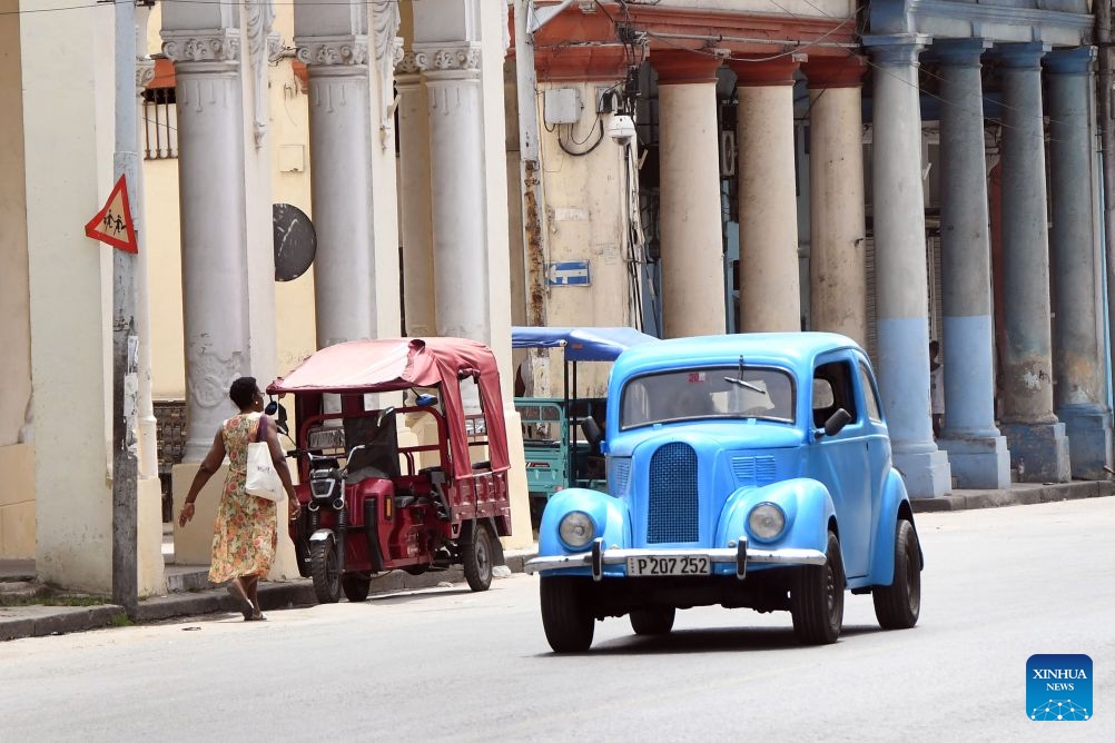 A man drives a vintage car along a street, in Havana, capital of Cuba, on July 8, 2026. Cuban Foreign Minister Bruno Rodriguez on Tuesday accused the U.S. government of carrying out multidimensional, non-conventional warfare against Cuba, which he said has lasted for almost seven decades and become ever crueler and more ruthless during the last seven months. The cumulative damage caused by the U.S. blockade since it was first imposed amounts to 178.7 billion U.S. dollars at current prices, according to Rodriguez. (Photo: Xinhua)