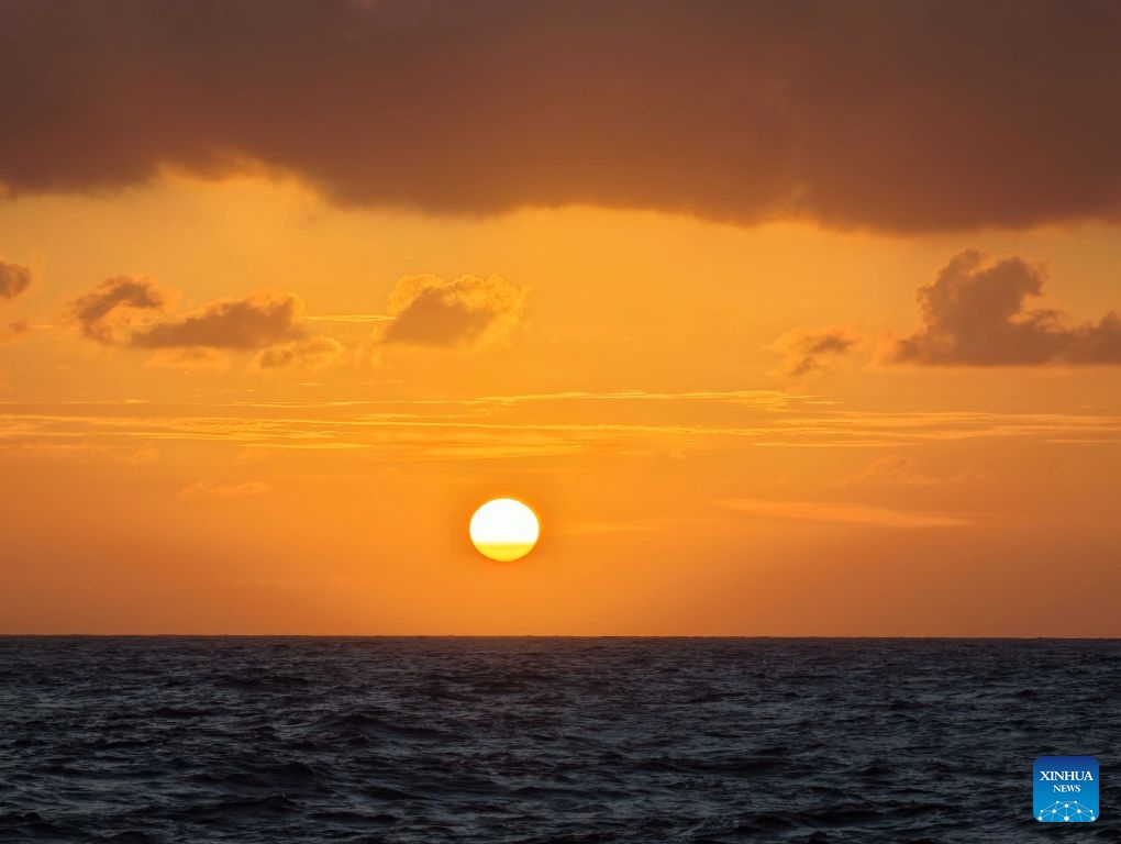 This photo taken on July 8, 2026 shows a view of the sunset over the waters surrounding the Xisha Islands, south China's Hainan Province. (Photo: Xinhua)