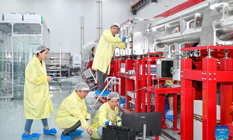 Researchers test a nanosecond laser at a laboratory of the Tsung-Dao Lee Institute of Shanghai Jiao Tong University in Shanghai, east China, July 7, 2026. Tsung-Dao Lee Institute of Shanghai Jiao Tong University in east China's Shanghai has been working to accelerate the construction of China's first dedicated laboratory astrophysics research platform. The platform will integrate a 3-petawatt high-power femtosecond laser, a dual-beam 700-joule nanosecond laser, and a 90-MeV electron accelerator into a single experimental facility. (Photo: Xinhua)