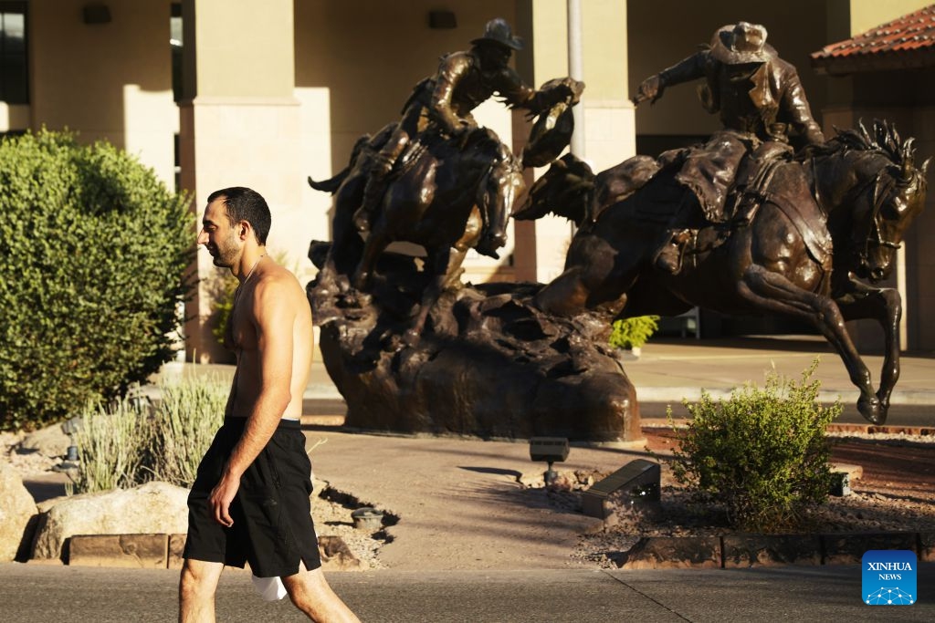 A man walks on a street amid a heat wave in Phoenix, Arizona, the United States, July 9, 2026. The temperature in Phoenix reached a high of 45 degrees Celsius on Thursday. (Photo: Xinhua)