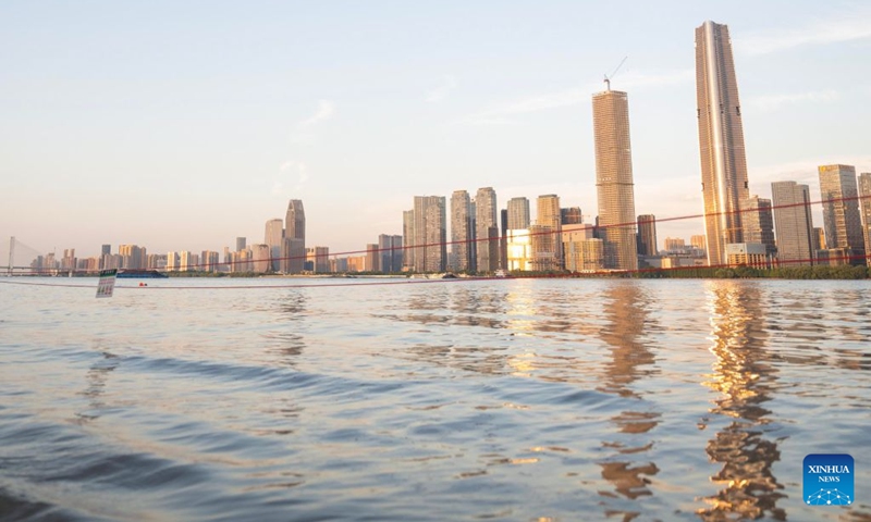 This photo taken on July 8, 2026 shows a submerged waterside tourist platform at the riverbank along the Yangtze River in Hankou of Wuhan, central China's Hubei Province. Affected by heavy rainfall, the water level in Wuhan section of the Yangtze River rose obviously on Wednesday. The water level at the Yangtze Hankou monitoring station reached 25.11 meters, 0.11 meters above the warning mark. (Photo: Xinhua)