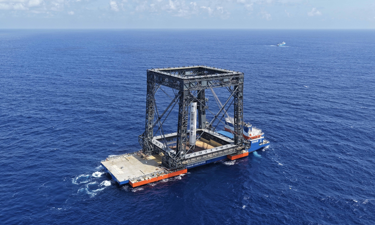 This drone photo taken on July 10, 2026 shows the successful capture of the returned first stage of Long March-10B carrier rocket on a seaborne platform via a net-capture system. Photo: Xinhua
