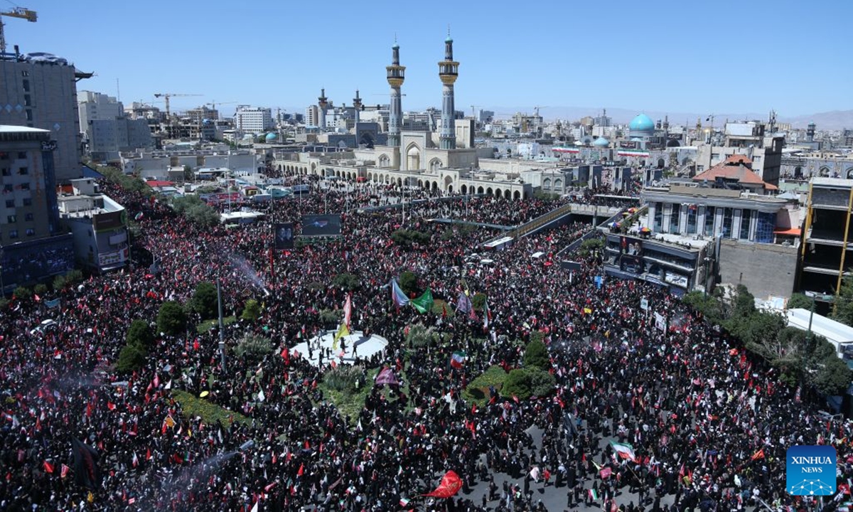 People attend the funeral procession of Iran's late Supreme Leader Ali Khamenei in Mashhad, Iran, July 9, 2026. Ali Khamenei was laid to rest in the northeastern Iranian city of Mashhad on Thursday. (Xinhua/Shadati)
