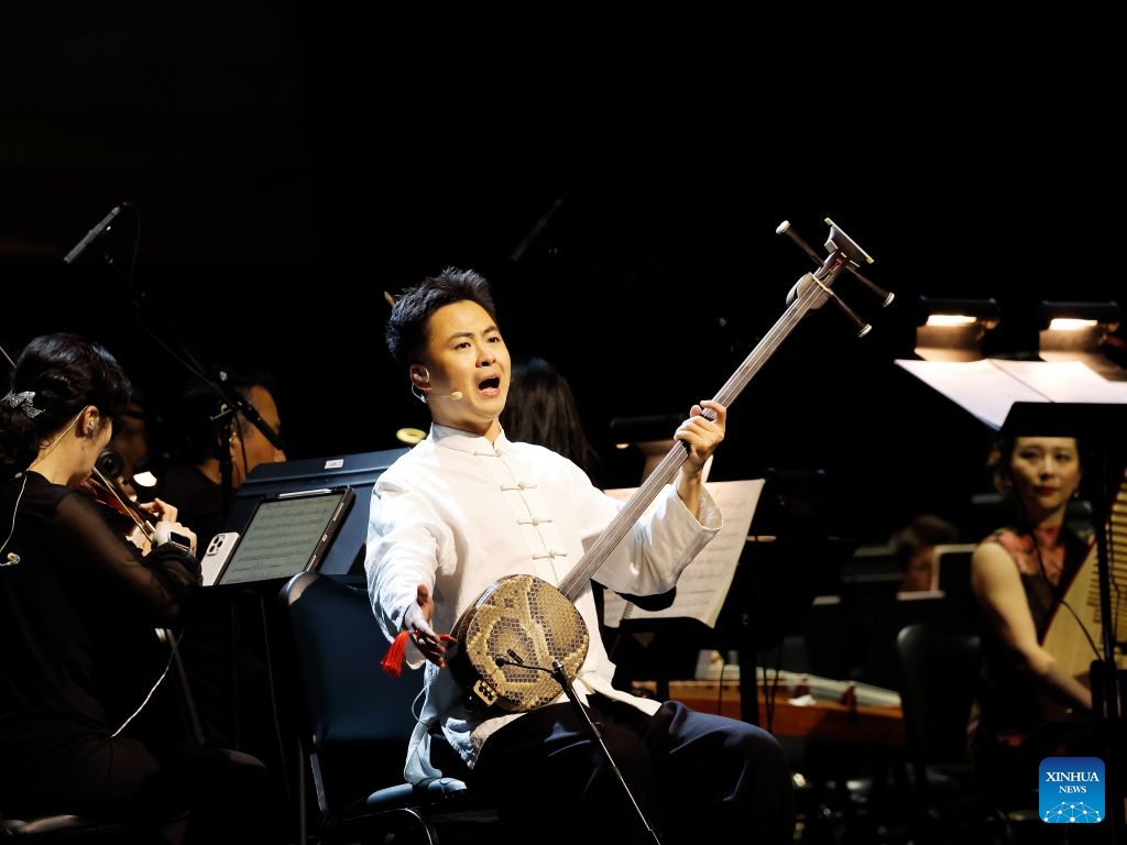 A Chinese artist performs during the Black Myth: Wukong concert at the Peacock Theater in downtown Los Angeles, California, the United States on July 7, 2026.

Music from the internationally acclaimed Chinese video game Black Myth: Wukong filled the Peacock Theater in downtown Los Angeles on Tuesday night, drawing thousands of fans to experience the unique fusion of Chinese mythology and Eastern aesthetics. (Photo by Qiu Chen/Xinhua)