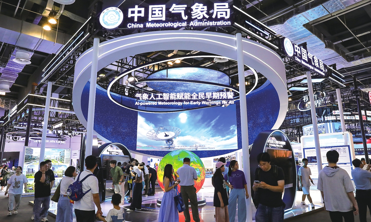 Visitors gather before the booth of the China Meteorological Administration at the 2025 World AI Conference held in Shanghai on July 27, 2025. Photo: VCG