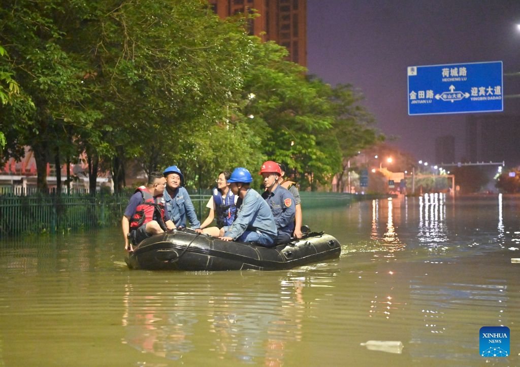 Rescuers take a boat through floodwater in Guigang, south China's Guangxi Zhuang Autonomous Region, July 9, 2026.
Guigang has suffered severe flooding due to torrential rains brought by Typhoon Maysak and upstream inflows. Local authorities have mobilized rescue forces to work around the clock, making every effort to ensure basic living needs for stranded residents. (Xinhua/Zhou Hua)