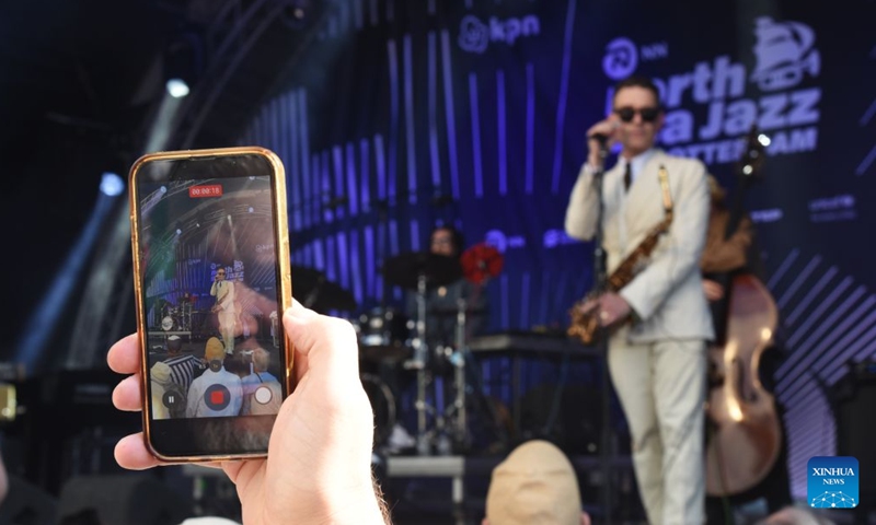 An audience records a jazz band's performance during opening day of the 50th North Sea Jazz Festival in Rotterdam, the Netherlands on July 10, 2026. (Photo: Xinhua)