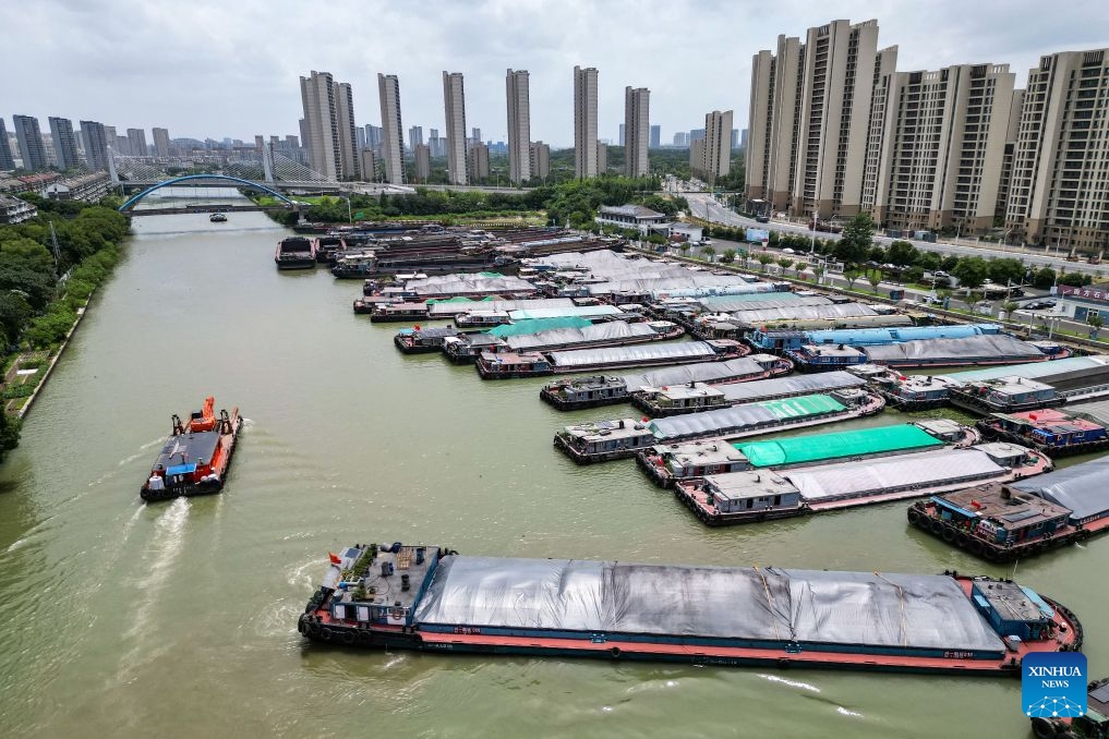 An aerial drone photo taken on July 11, 2026 shows vessels mooring along the shore in response to the incoming typhoon in Huzhou, east China's Zhejiang Province. (Photo: Xinhua)
