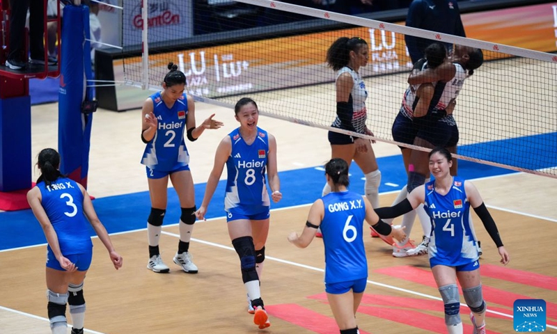 Players of China celebrate after scoring during the match between China and the Dominican Republic at the Women's Volleyball Nations League (VNL) 2026 in Hong Kong, south China, July 11, 2026. (Xinhua/Zhu Wei)
