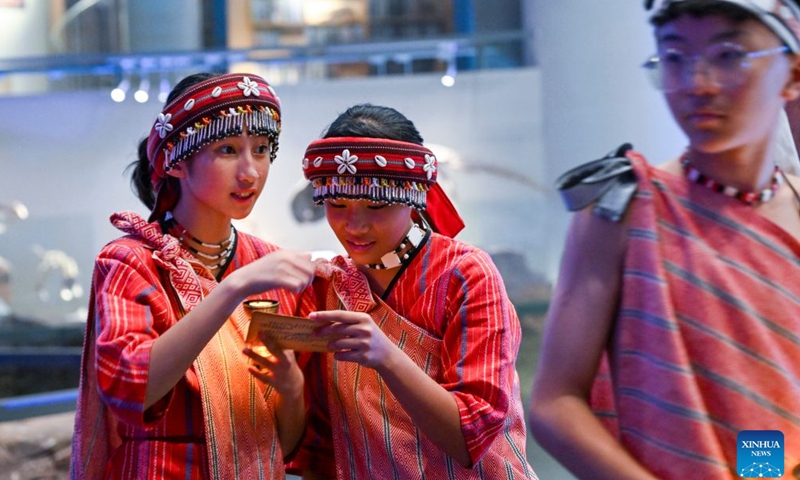 Kids from Taiwan participate in an event at the Chongqing Natural History Museum in southwest China's Chongqing Municipality, July 10, 2026. From July 9 to 12, young people from China's Taiwan and Chongqing participate in a series of cultural events in Chongqing.