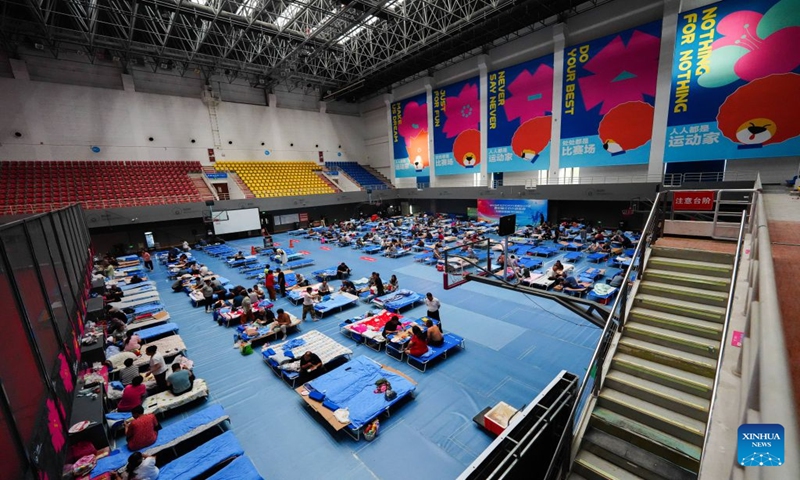 This photo taken on July 11, 2026 shows a temporary shelter in the district sports center at Pinggu District in Beijing, capital of China.

