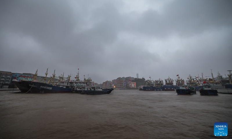 Fishing boats take shelter from the typhoon at a port in Donghai Village of Wenling City, east China's Zhejiang Province, on July 11, 2026. Chinese authorities on Saturday intensified emergency response measures with Typhoon Bavi set to slam into the country's eastern coast, resulting in meteorological, water resources, transport and emergency management authorities issuing alerts and reinforcing flood-control efforts ahead of the expected landfall.