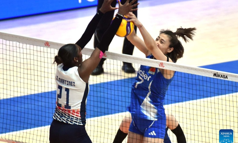 Wang Yuanyuan (R) of China spikes the ball during the match between China and the Dominican Republic at the Women's Volleyball Nations League (VNL) 2026 in Hong Kong, south China, July 11, 2026. (Xinhua/Lo Ping Fai)
