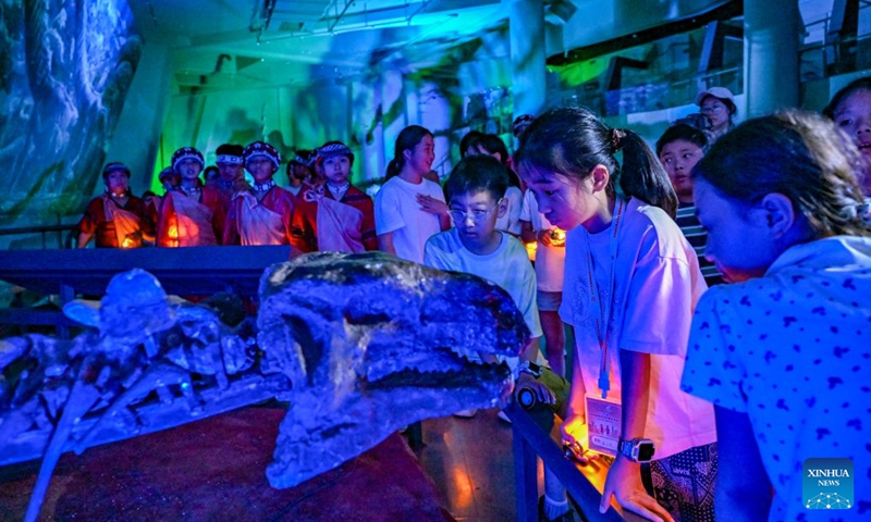 Kids from both sides of the Taiwan Strait participate in an event at the Chongqing Natural History Museum in southwest China's Chongqing Municipality, July 10, 2026. From July 9 to 12, young people from China's Taiwan and Chongqing participate in a series of cultural events in Chongqing.
