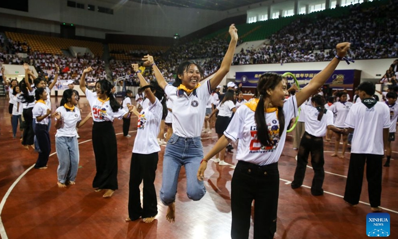 Students celebrate during a friendly sports competition at the National Indoor Stadium (1) in Yangon, Myanmar, July 12, 2026. (Xinhua/Myo Kyaw Soe)