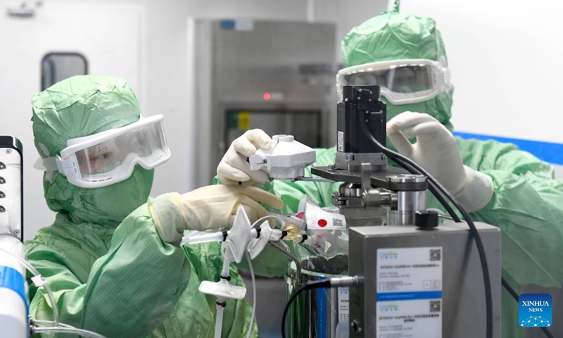 Staff members work at the stem cell production line of Shandong Qilu Cell Therapy Engineering Technology Co., Ltd. in Jinan High-tech Industrial Development Zone in Jinan, east China's Shandong Province, July 11, 2026.