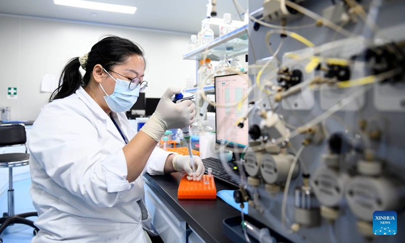 A staff member conducts 3D stem cell culture experiments at Shandong Qilu Cell Therapy Engineering Technology Co., Ltd. in Jinan High-tech Industrial Development Zone in Jinan, east China's Shandong Province, July 11, 2026.