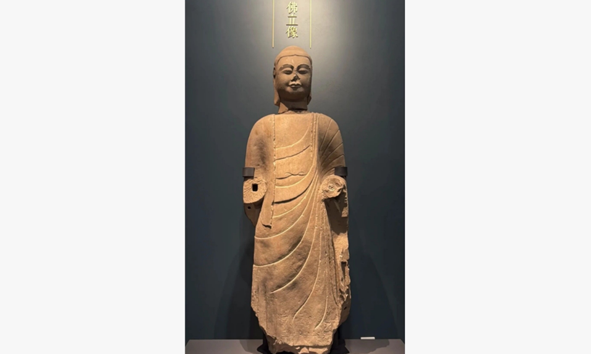 The reassembled Buddha head and standing Buddha statue are displayed at the Fenyang Museum. Photo: Official WeChat account of the Fenyang Museum