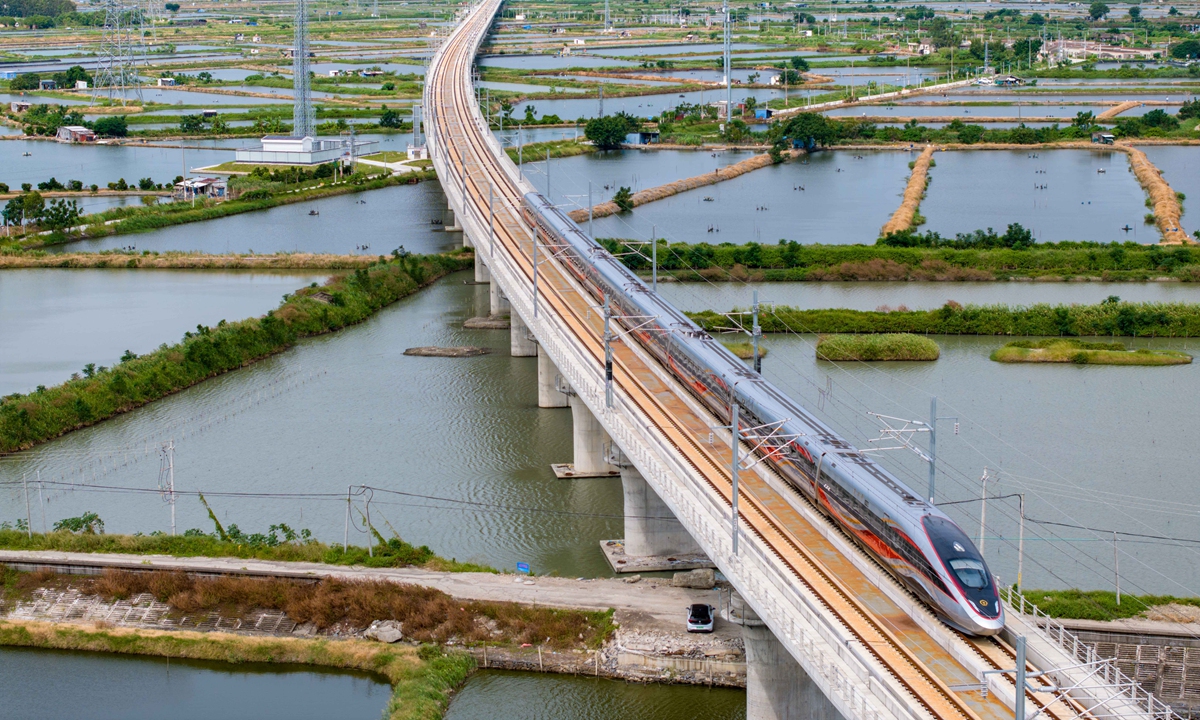 A CR400BF Fuxing bullet train travels past paddy fields in Haifeng county, Shanwei city, South China's Guangdong Province. Photo: Courtesy of CRRC Tangshan Co., Ltd.
