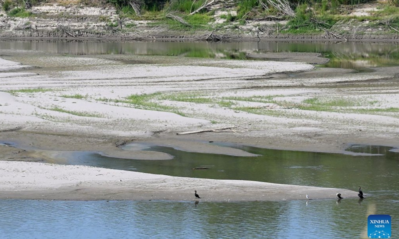 This photo taken on July 12, 2026 shows a view of the drought-stricken Po River in Revere, Mantova, northern Italy. According to the Po River Basin Authority, the Po River basin continues to face severe drought conditions as a result of the persistent heatwave and continued absence of rainfall. (Photo by Alberto Lingria/Xinhua)