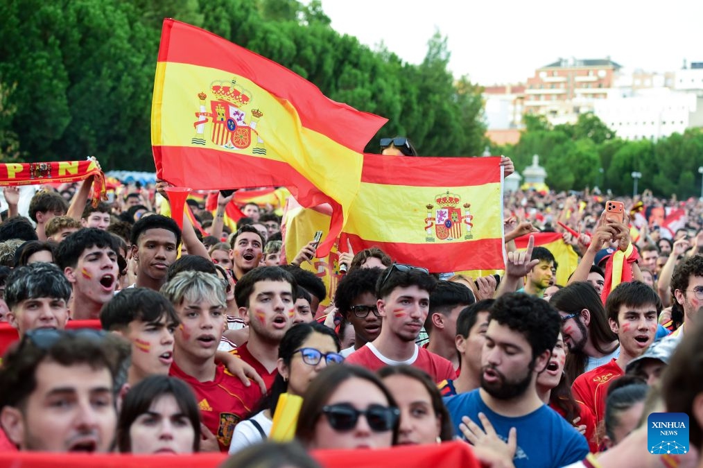 Fans of Team Spain watch the live broadcast of the 2026 FIFA World Cup semifinal match between France and Spain in Madrid, Spain, July 14, 2026. (Photo: Xinhua)