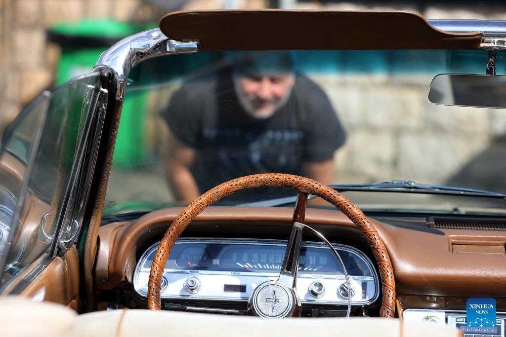 A man visits the classic cars exhibition in Aley, Lebanon, July 12, 2026. (Photo: Xinhua)