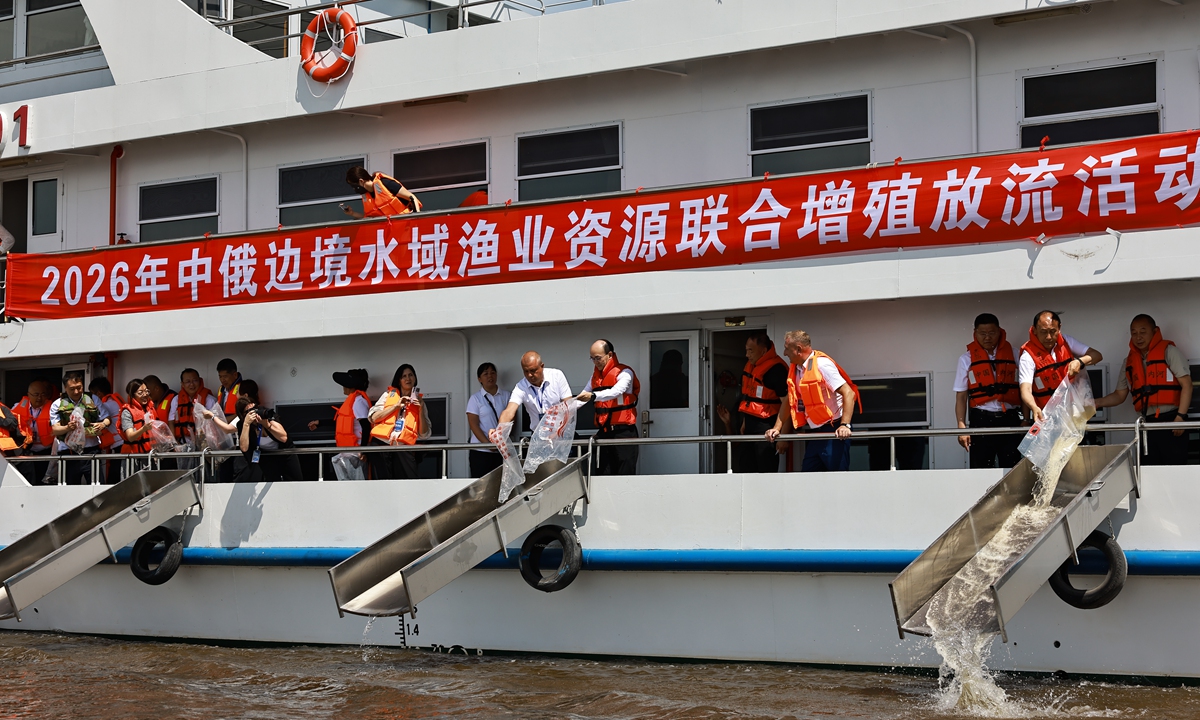 Chinese and Russian representatives participate in the joint fish stock enhancement and release activity in Tongjiang, Jiamusi, Northwest China's Heilongjiang Province on July 14, 2026. Photo: Deng Xiaoci/GT