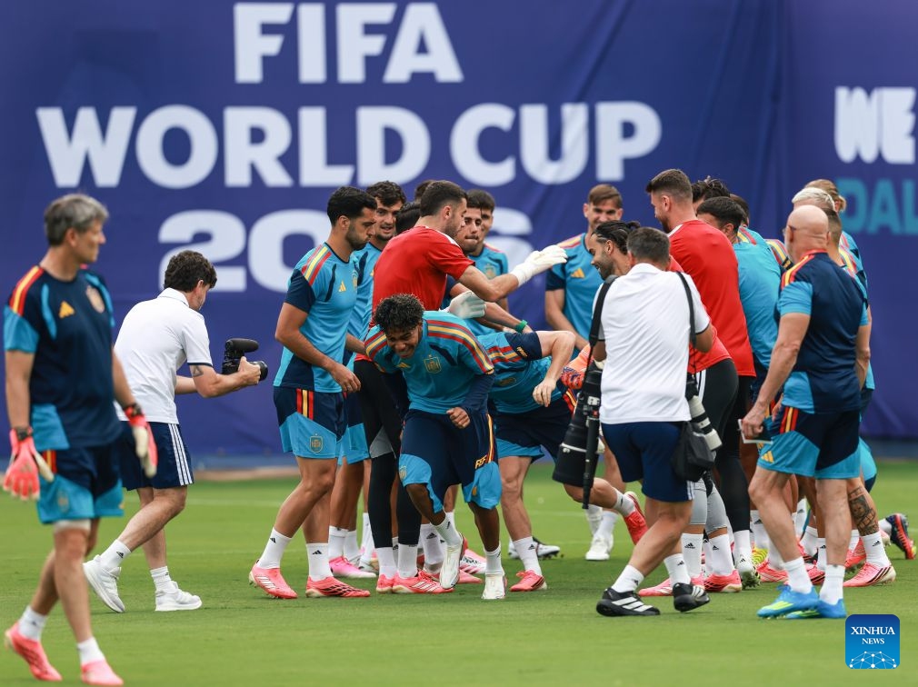Players of Spain celebrate the birthday of Lamine Yamal and Victor Munoz before a training session ahead of the semi-final match between France and Spain at the 2026 FIFA World Cup in Dallas, the United States, on July 13, 2026. (Photo: Xinhua)