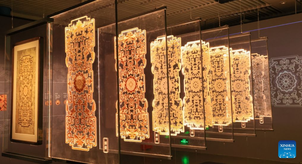 This photo taken on July 14, 2026 shows exhibits during A Garden Within: An Immersive Light and Shadow Exhibition of the Qianlong Garden at National Museum of Classic Books in Beijing, capital of China. The exhibition, which features multiple immersive scenarios and interactive installations, is held here from July 9 to Dec. 6. The Qianlong Garden, also known as the Garden of the Palace of Tranquil Longevity, was built by Emperor Qianlong (1711-1799) of Qing Dynasty (1644-1911) as a private retreat for his later years in the Forbidden City, or today's Palace Museum. (Photo: Xinhua)