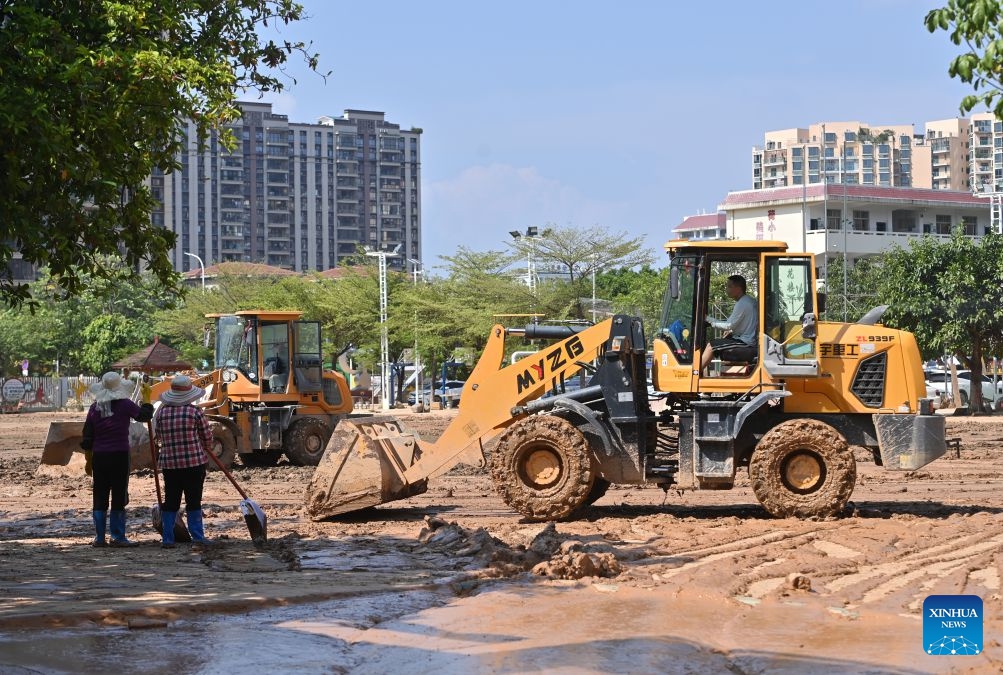 Staff members remove sludge in Guigang City, south China's Guangxi Zhuang Autonomous Region, July 13, 2026. As Typhoon Maysak recedes, Guigang City has initiated efforts to pump out water, clear sludge, and restore power supply, striving to bring people's production and daily life back to normal. (Photo: Xinhua)