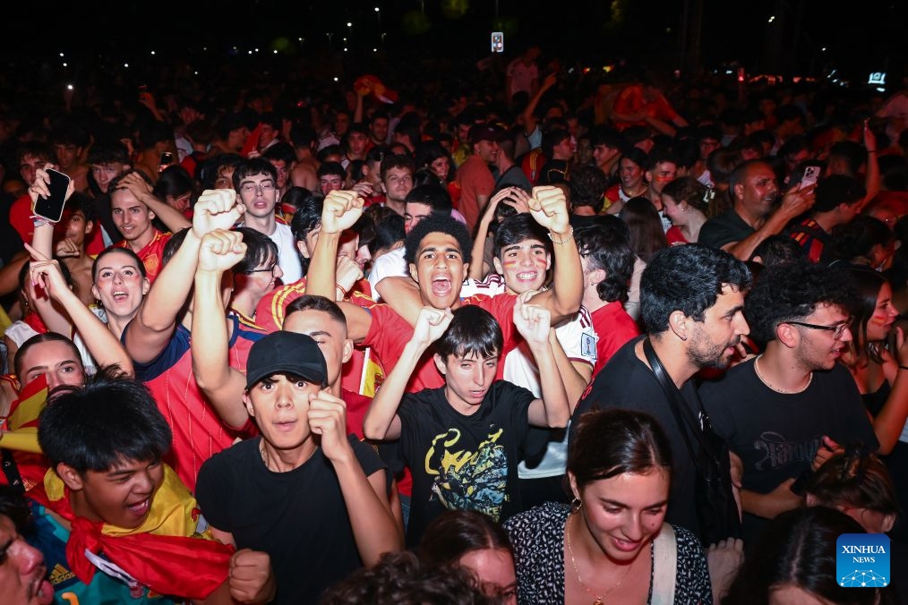 Fans of Team Spain celebrate while watching the live broadcast of the 2026 FIFA World Cup semifinal match between France and Spain in Madrid, Spain, July 14, 2026. (Photo: Xinhua)
