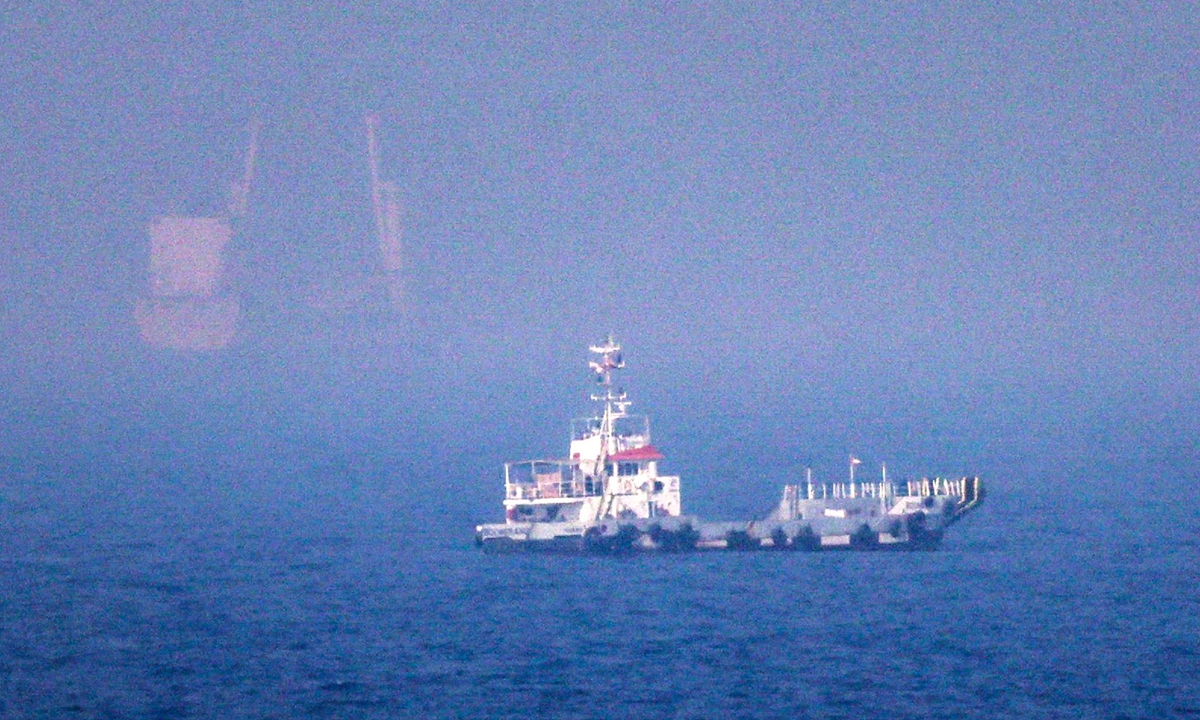 This picture shows ships sailing near the Strait of Hormuz off the eastern coast of the United Arab Emirates at Khor Fakkan on July 13, 2026. Photo: VCG