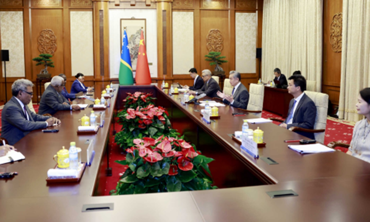 Chinese Foreign Minister Wang Yi held talks with Rick Houenipwela, minister for foreign affairs and external trade of the Solomon Islands, in Beijing on July 14, 2026. Photo: Chinese Foreign Ministry