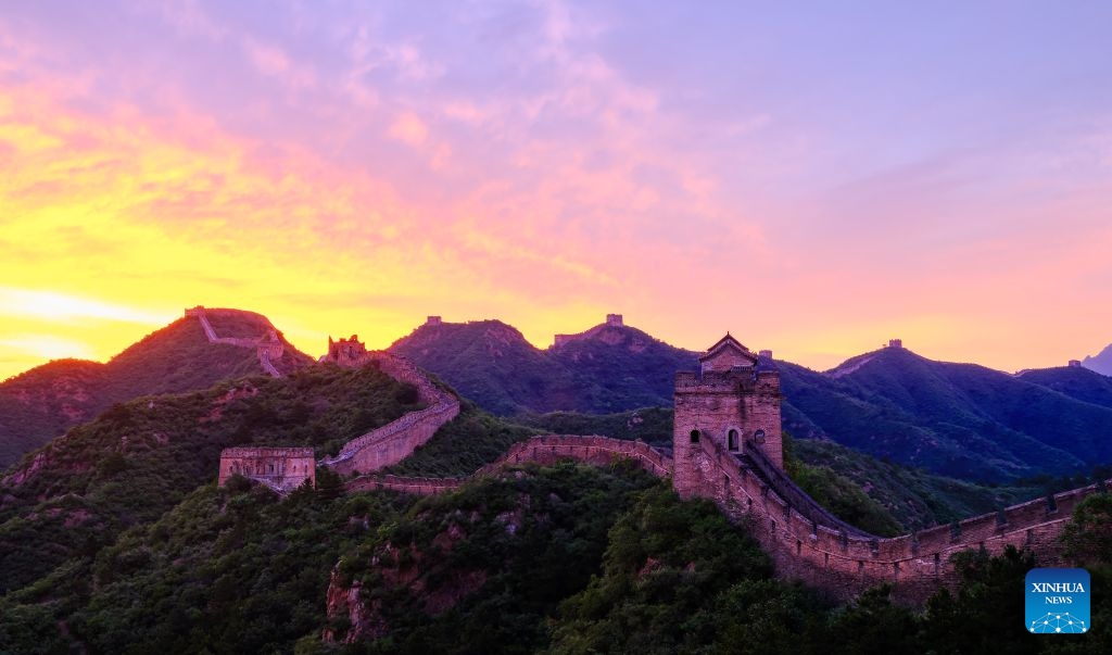 This photo shows a view of the Jinshanling section of the Great Wall at sunrise at Luanping County of Chengde City, north China's Hebei Province, July 16, 2026. (Photo: Xinhua)