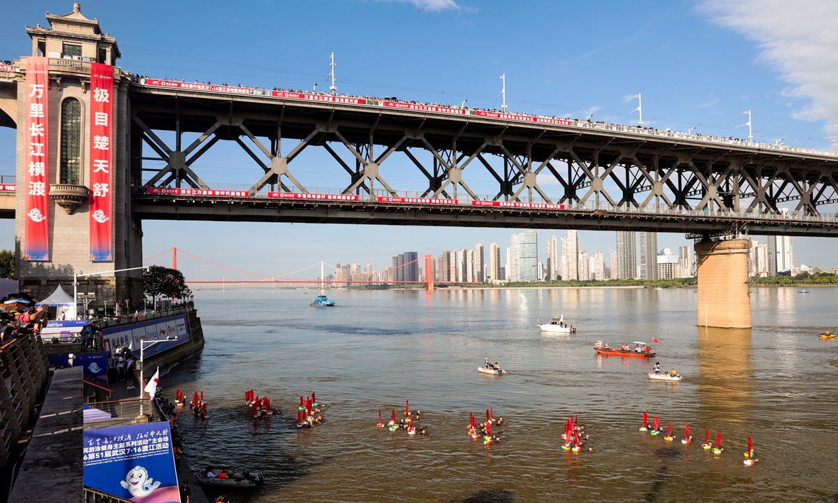 Participants take part in the Yangtze River Crossing Event in Wuhan, Central China's Hubei Province, on July 16, 2026. Thousands of swimming enthusiasts gathered at the wharf to swim across the Yangtze River, presenting the magnificent scene evoked by Chairman Mao Zedong's famous line: