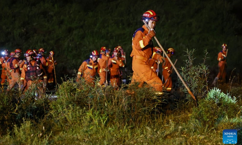 Rescue operations are underway at the flood-hit area in Weiyuan County, northwest China's Gansu Province, July 26, 2026. 