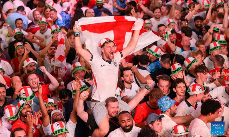 England football fans react while watching the live broadcast of the semifinal of the 2026 FIFA World Cup between England and Argentina at Box Park venue Wembley in London, Britain, July 15, 2026. (Photo: Xinhua)